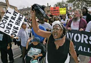 Residents march to protect their beloved, execrable squalor.